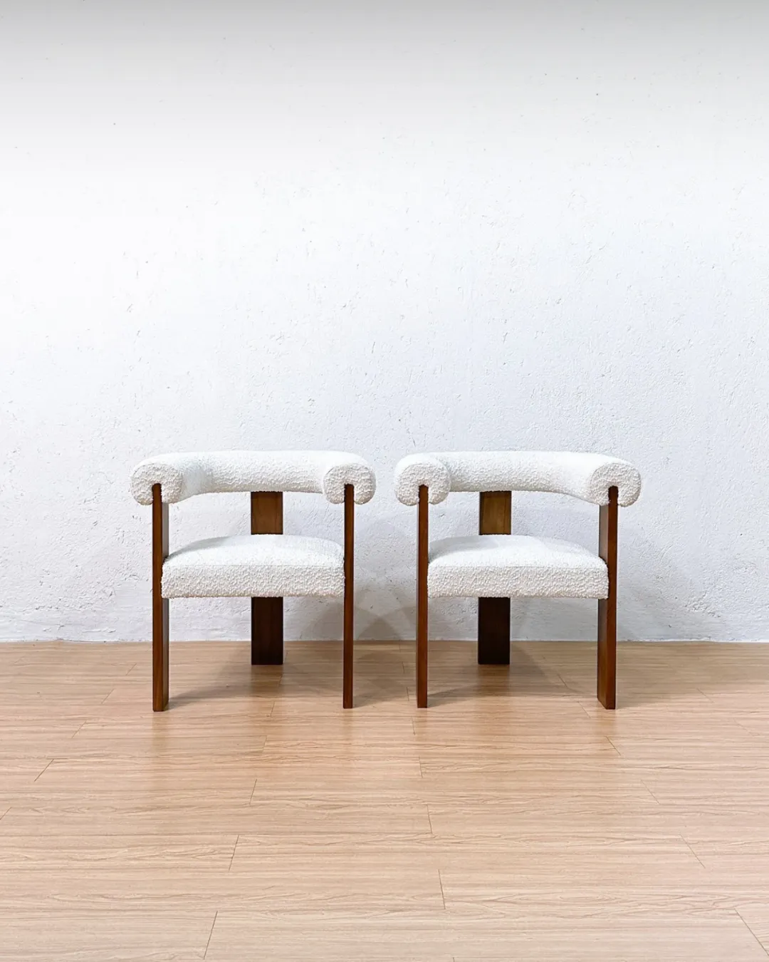 Eldon accent chair with solid teak wood frame and boucle fabric upholstery