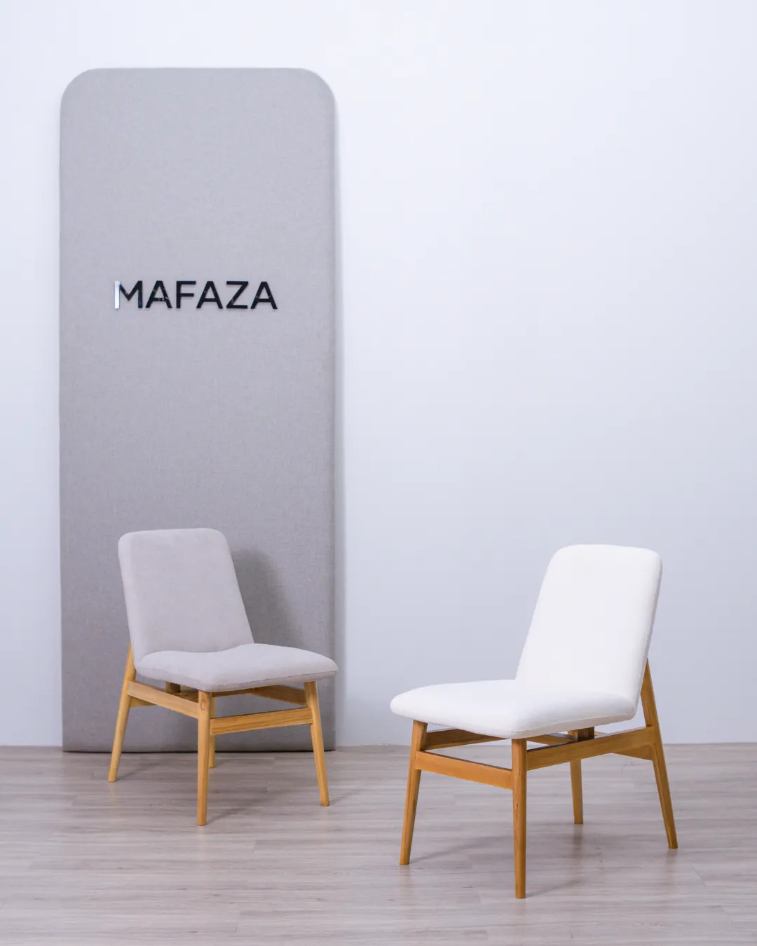 Modern Silvi Dining Chair featuring a bleached certified teak wood frame and high-quality Hikaron terry fabric upholstery in a neutral tone with Royal Foam padding.