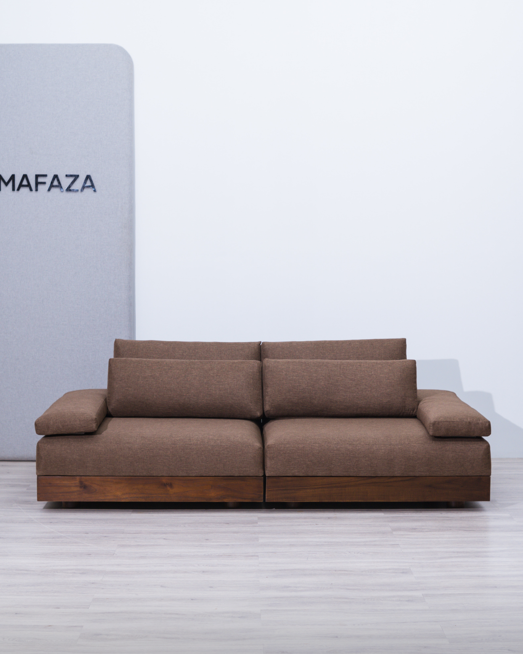 Modern Truro 2-seater modular sofa crafted from light chestnut solid teak wood, featuring deep cushions upholstered in Nexstar Hikaron fabric, perfect for a minimalist living room.