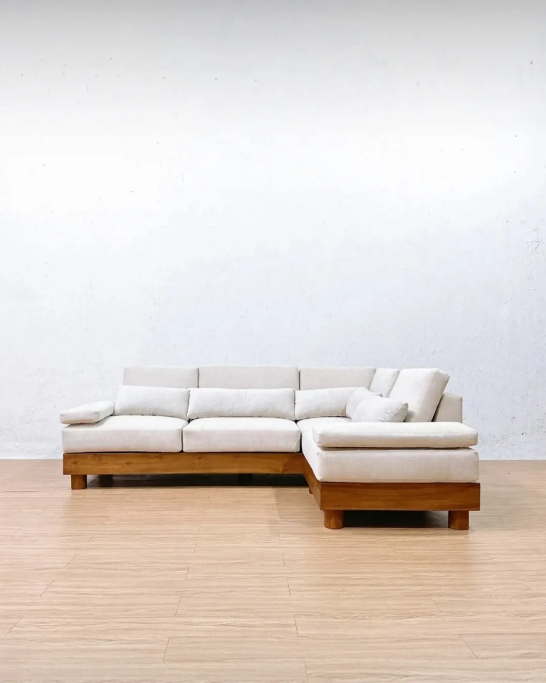 Truro L-shaped teak sofa with customizable backrest design for modern interiors