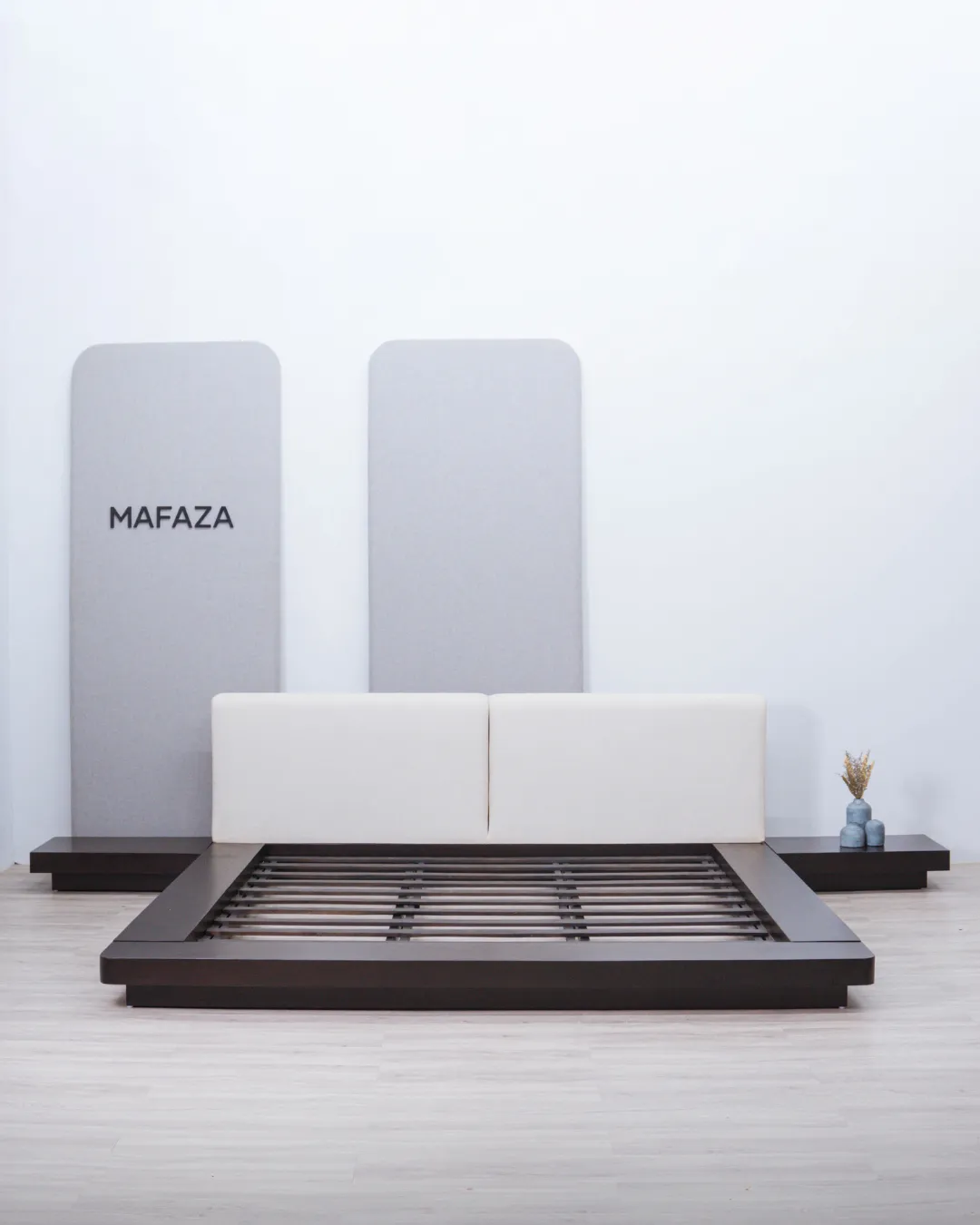 Luxurious Worth Curved Bed Frame for 200x200 mattress featuring a dark chestnut solid teak wood frame, curved upholstered headboard in Domy Hikaron fabric, and low-profile integrated side tables.