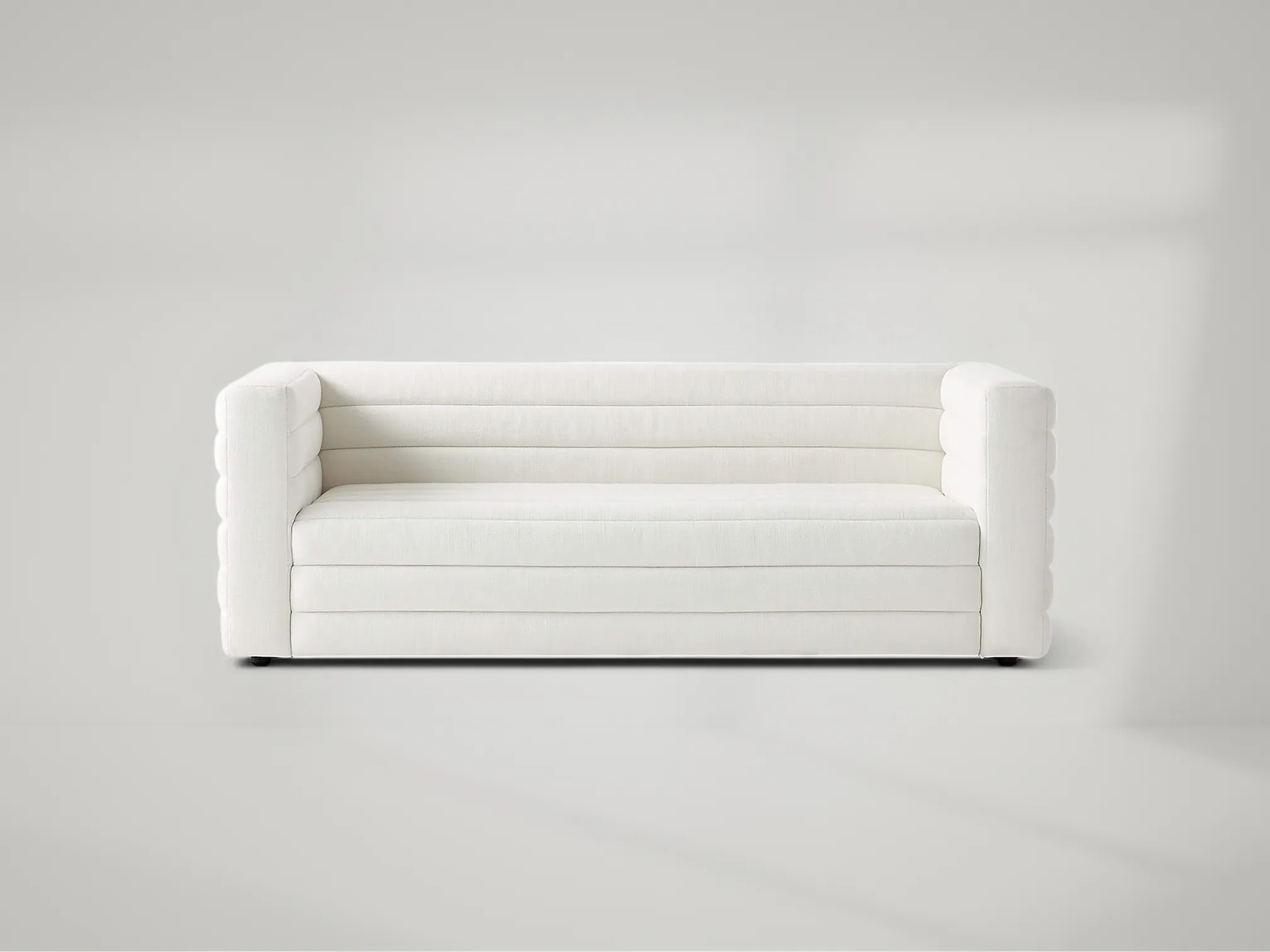 Strato Channeled Sofa – Channeled upholstered sofa with sculptural presence and artisanal quality by Mafaza Living