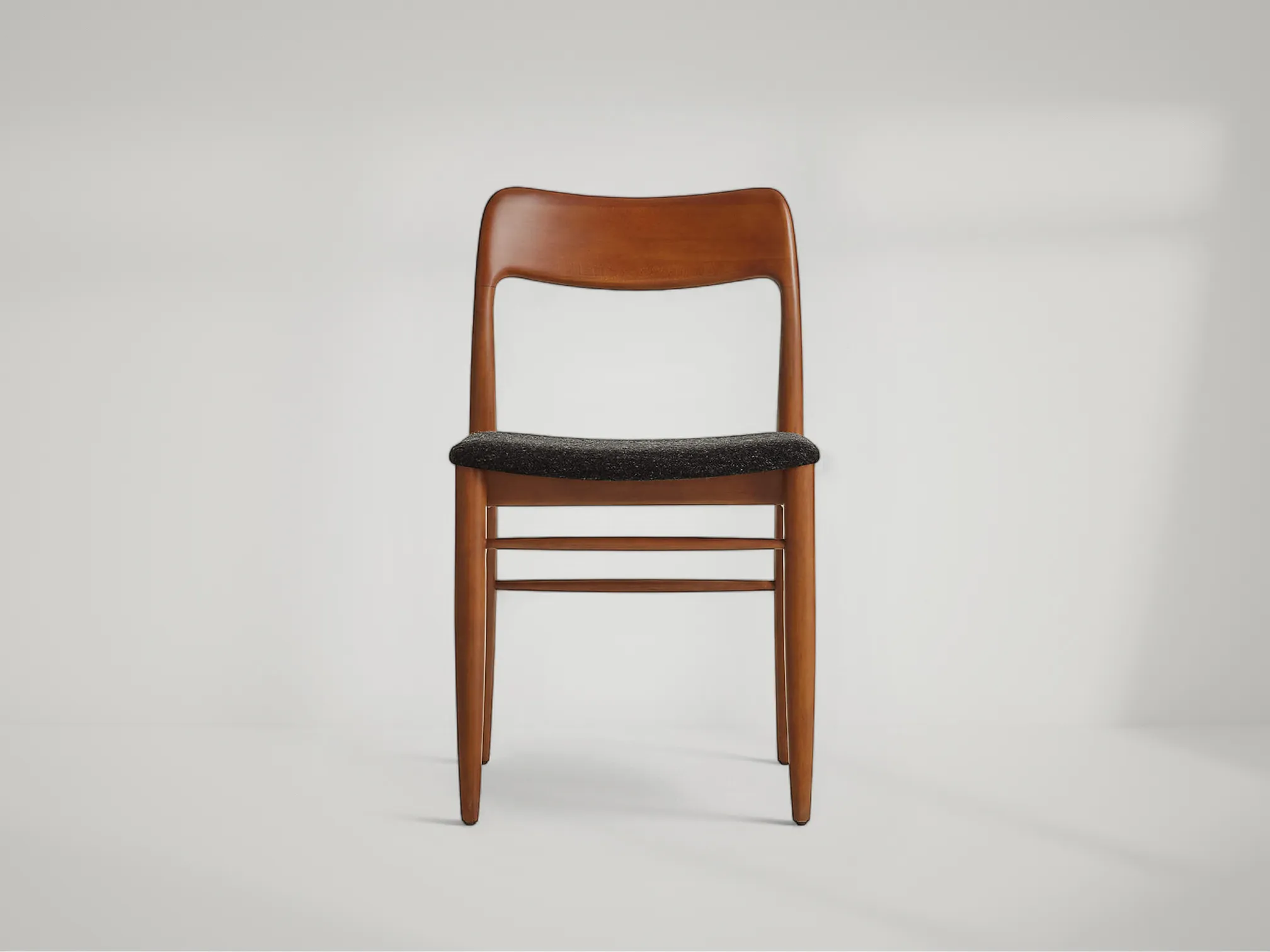 Tate warm brown teak dining chair with elegant simplicity and modern warmth by Mafaza Living