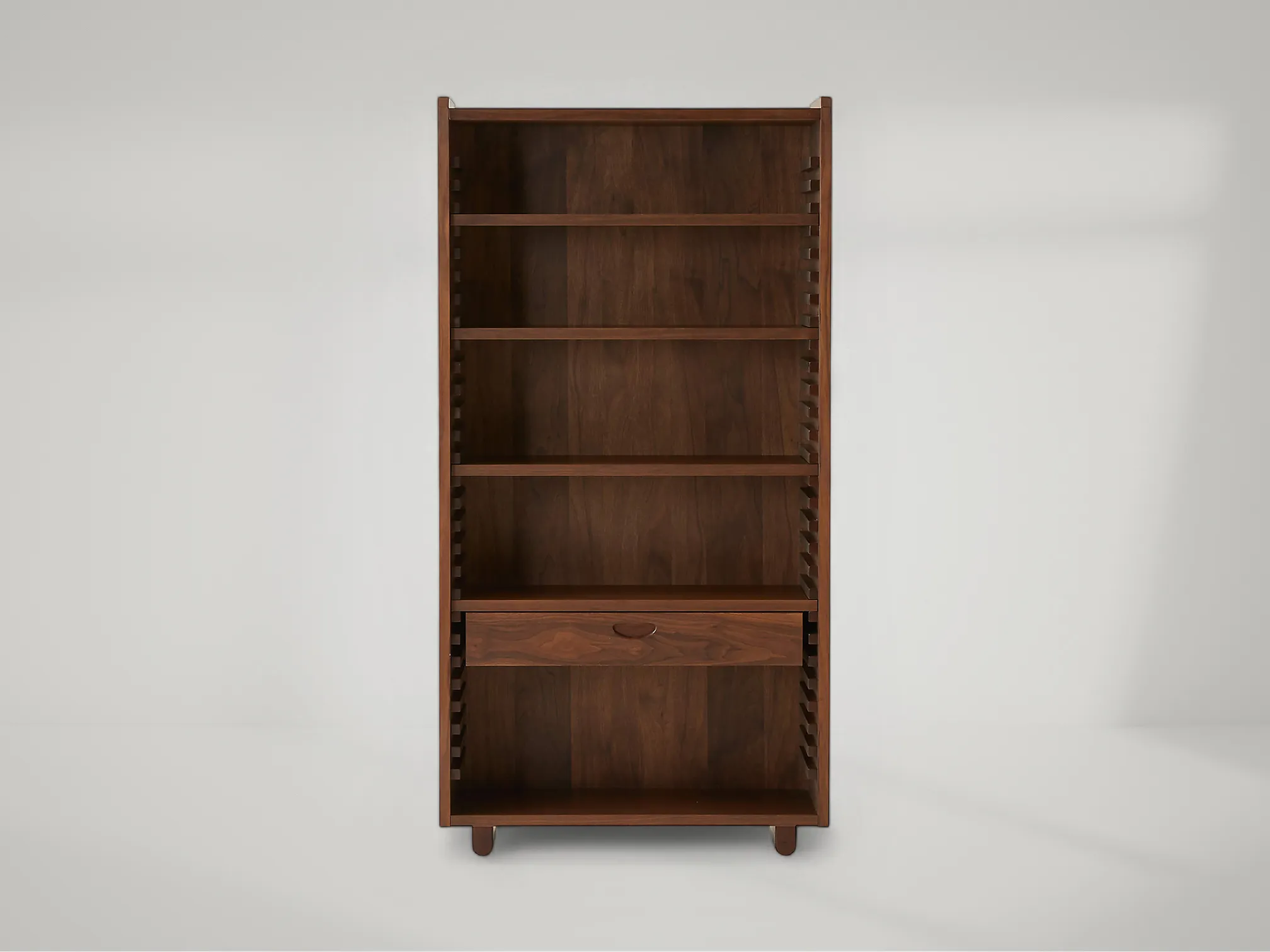Ventura tall teak bookcase combining height, craftsmanship, and sleek architectural form by Mafaza Living