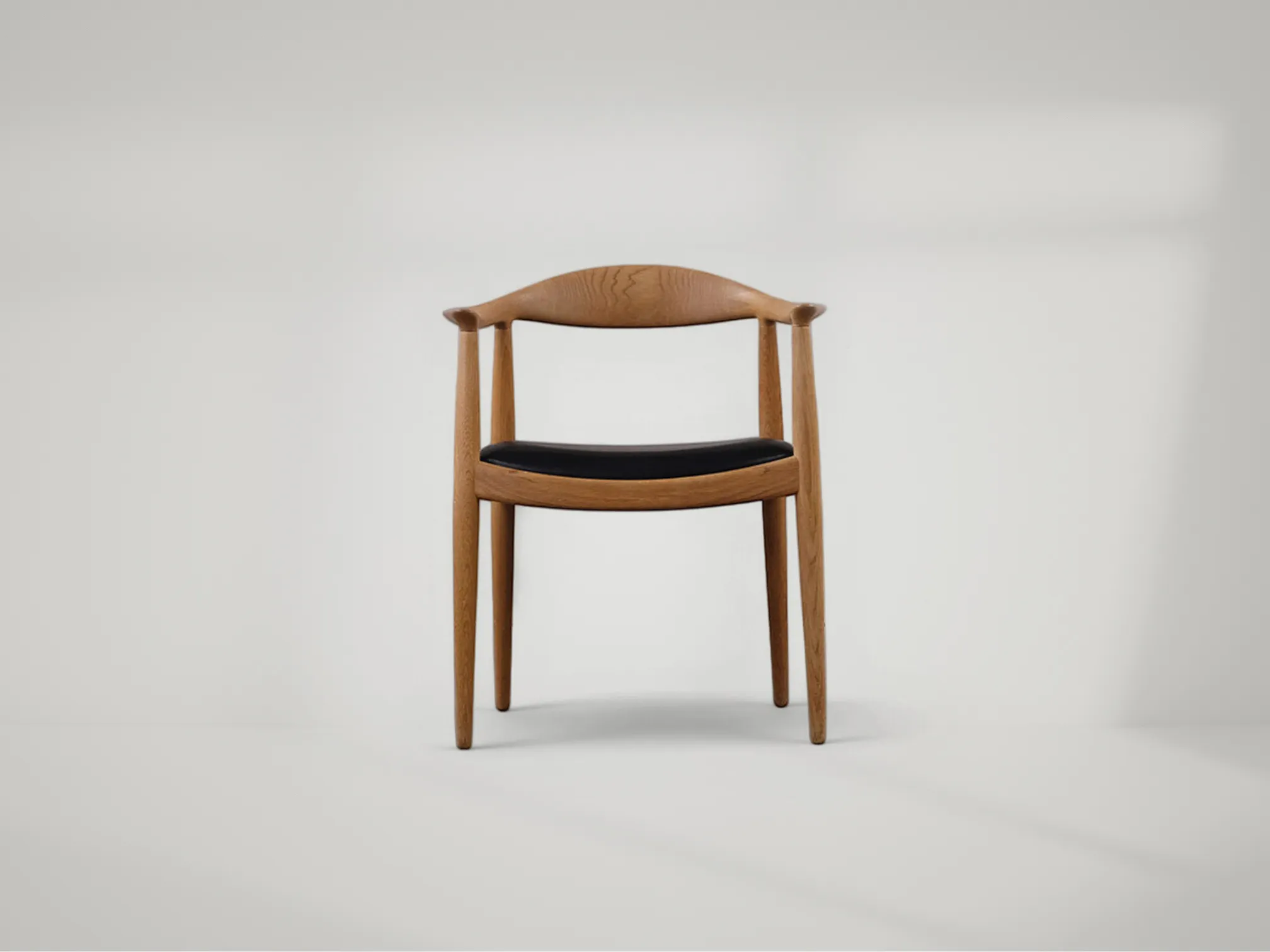 Wegner-inspired round dining chair in solid teak with classic mid-century charm by Mafaza Living